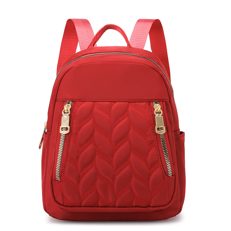 Mochila de moda transfronteriza para mujer, nueva mochila casual de rombo simple, bolsa de tela de color sólido de tendencia coreana al por mayor