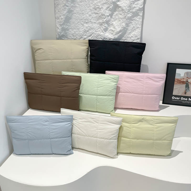 Coreia transfronteriza almohada puff bolso de computadora 13 pulgadas para bolsas de cubierta macbook bolsas de almacenamiento antichoque de mano