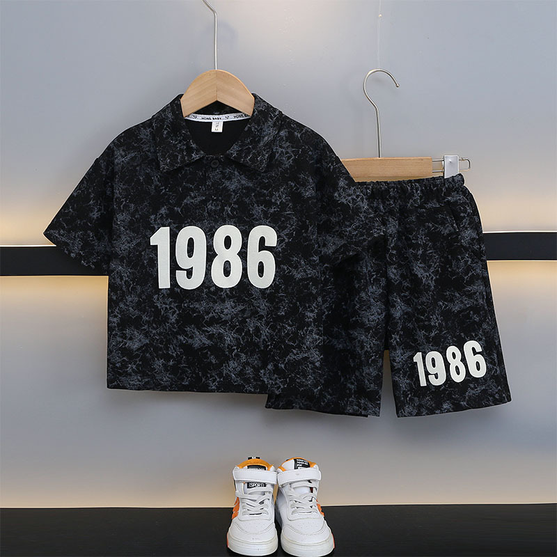 7189 ropa de verano para niños 2025 nuevo traje deportivo de camisa polo para niños de manga corta para niños de mediana edad y grandes