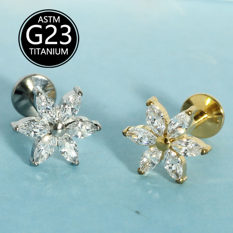 Silver pointed spike labret stud material detail