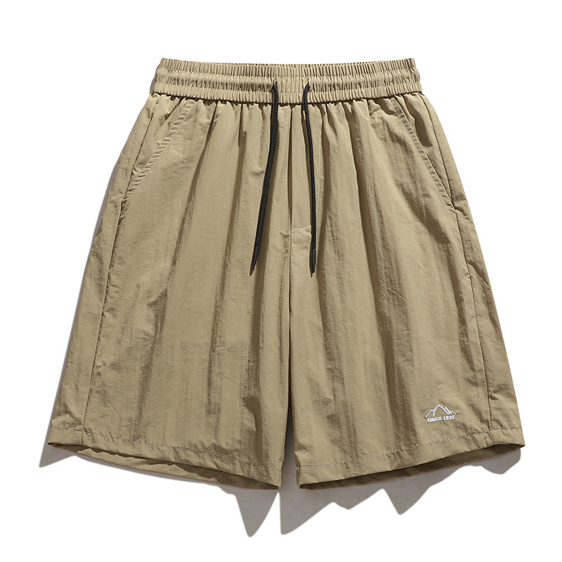 Pantalones cortos de paracaidista de secado rápido al aire libre de la NASA Pantalones cortos de cinco puntos deportivos casuales de moda sueltos de verano americano para hombres Pantalones cortos transpirables