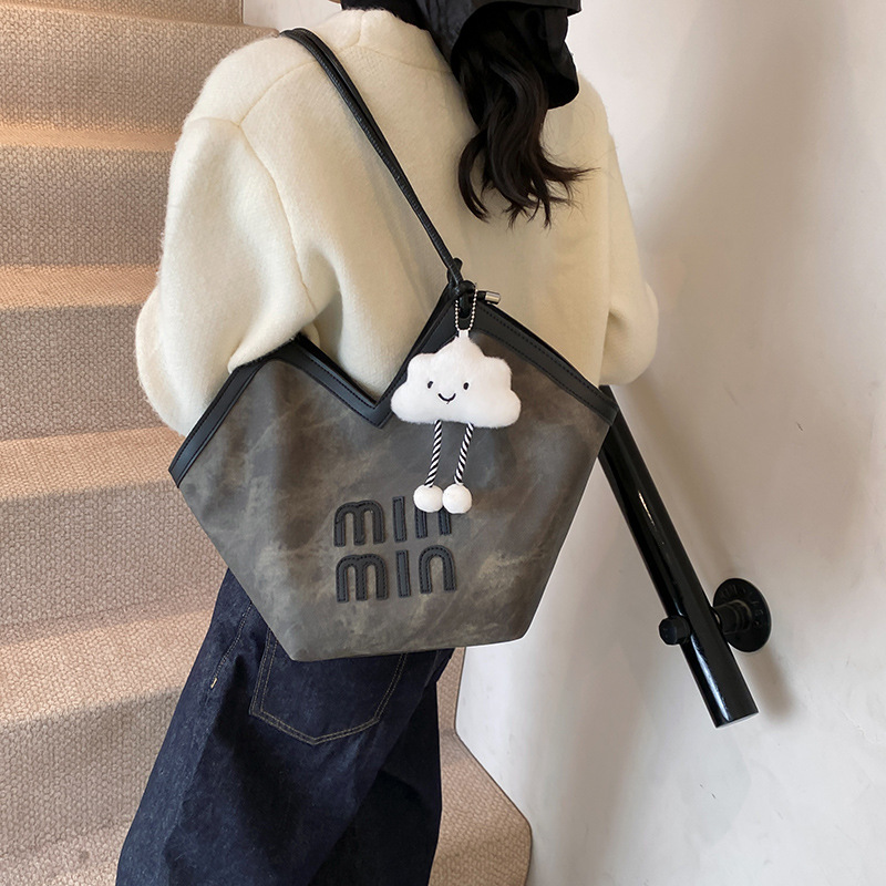 2024 nueva bolsa de gran capacidad para mujeres, bolso de hombro Sen Meng, bolso de diseño de nicho, bolso de viaje de alta calidad para mujeres