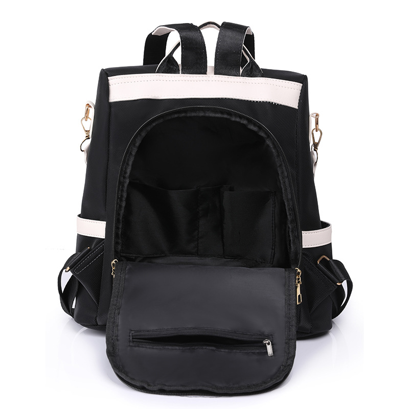 Bolso mujer 2023 nueva mochila de nailon para mujer coreana simple y versátil mochila de color de contraste ligero al aire libre al por mayor