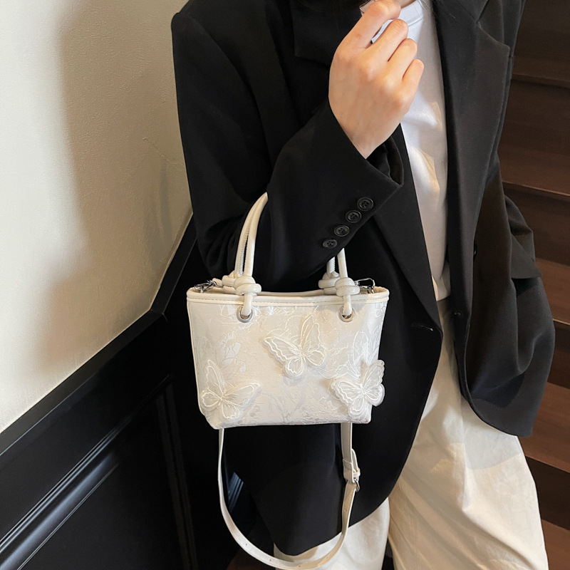 Nuevo bolso de estilo chino 2025 primavera y verano nuevo bolso de hombro de estilo chino fresco bolso de mensajero de mariposa de encaje mujer