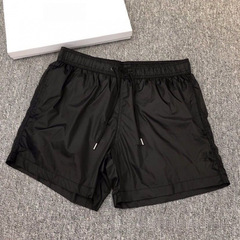 キャンディーカラーのクラシックスポーツビーチパンツカジュアル薄い夏速乾性七分パンツメンズショーツ厚い