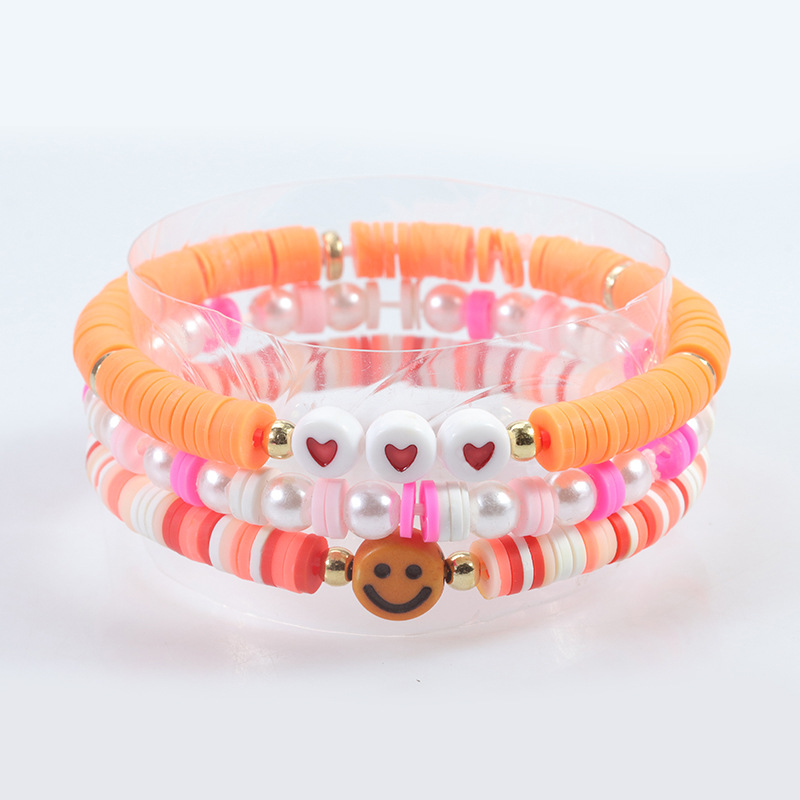 AliExpress caliente suave cerámica traje Pulsera Rosa Suave cerámica cara sonriente pulsera fábrica a largo plazo en stock al por mayor