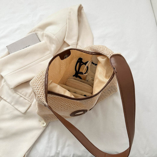 Niche hollow design bag for women 2024 new fashion straw shoulder bag versatile armpit woven tote bag