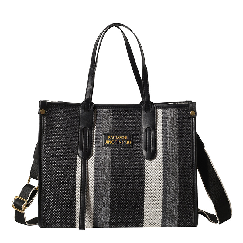 Bolso Tote portátil a rayas de color de contraste de lona para mujer 2024 nueva textura de moda transfronteriza bolso de mensajero de un solo hombro