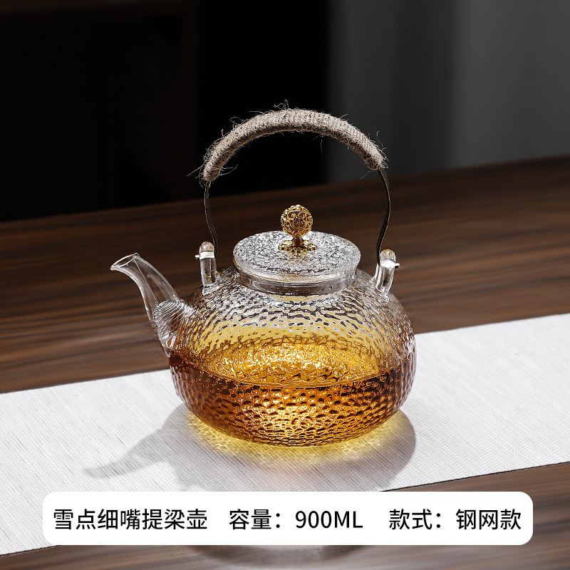 Venta directa de fábrica Tetera de vidrio con alto contenido de borosilicato Tetera de espuma con patrón de martillo de viga de elevación de metal Tetera de vidrio de alta calidad para el hogar