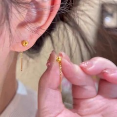シンプルな金色の如意耳線2025春夏の新商品の大衆の軽さと豪華な質感に合わせて、精巧で甘いイヤリングの耳飾りがあります。
