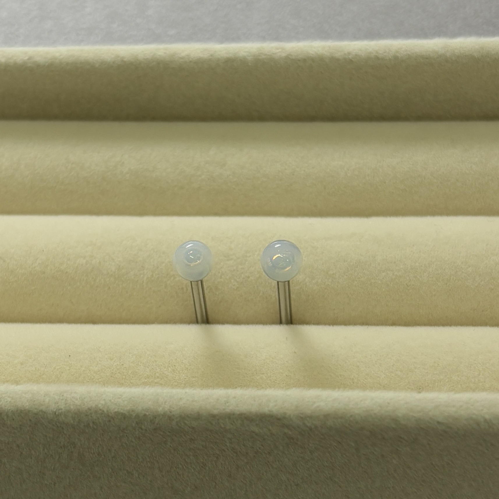 Silver pointed spike labret stud material detail