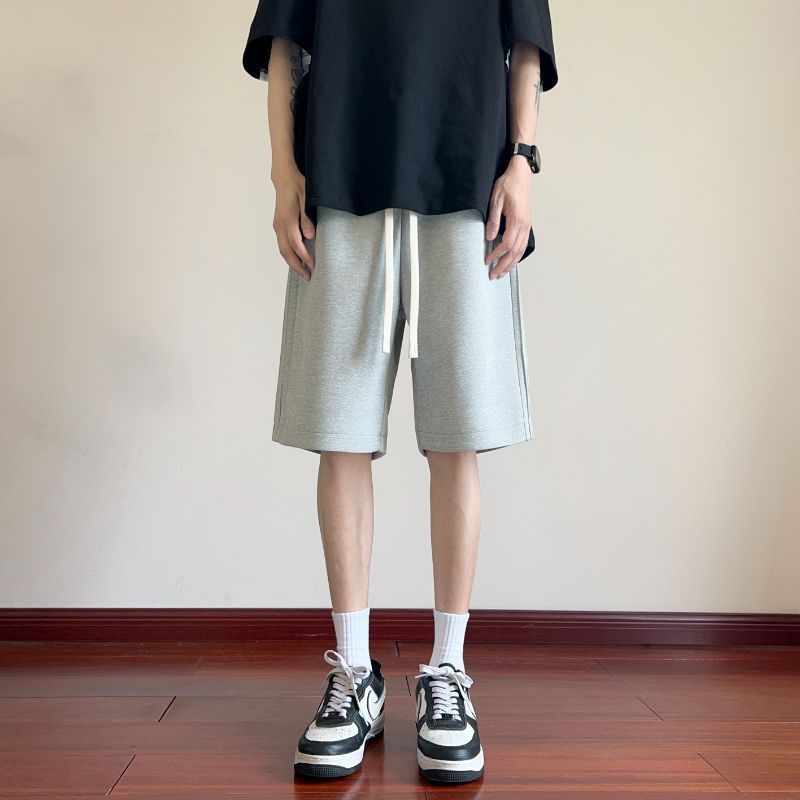 Pantalones cortos para hombres de verano delgados 2024 nuevos pantalones casuales de cinco puntos de moda pantalones deportivos de piernas largas sueltos para hombres