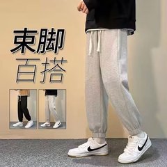 春と秋の足のスポーツの衛ズボンの男性のファッションの大きいサイズのゆったりしているストレートの筒の9分のズボンの香港の風の純色の百合のカジュアルなズボン