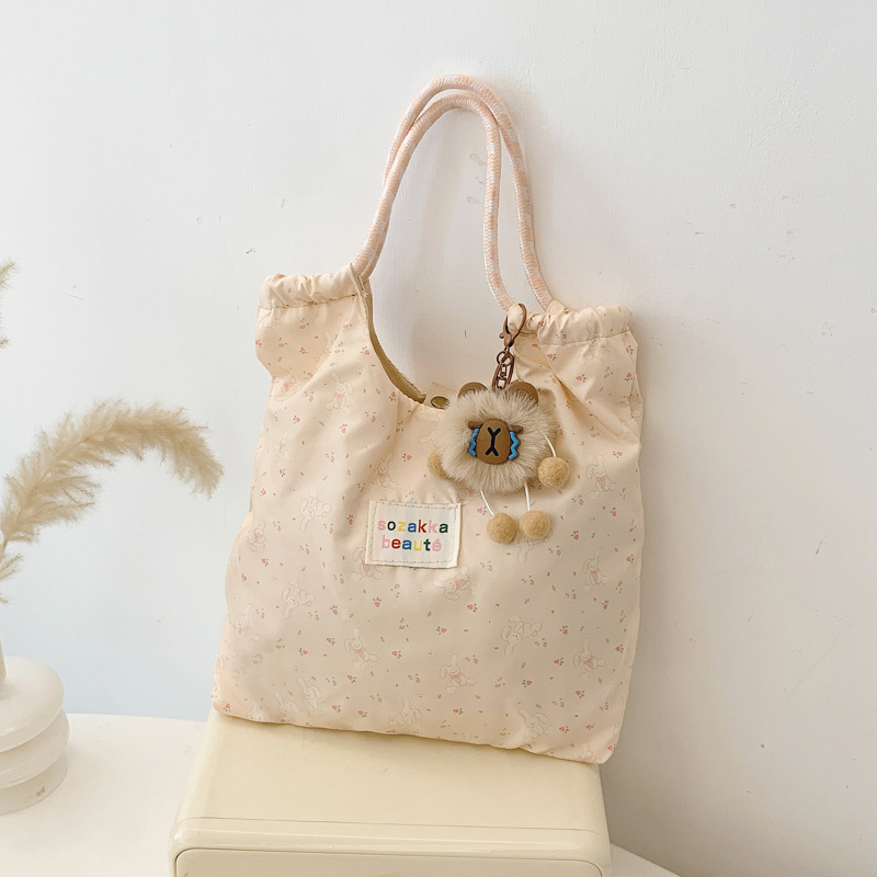 Japonés lindo y suave estudiante de gran capacidad bolso de hombro de mujer versión coreana pequeña fresca impresión de chicas bolsas de compras portátiles