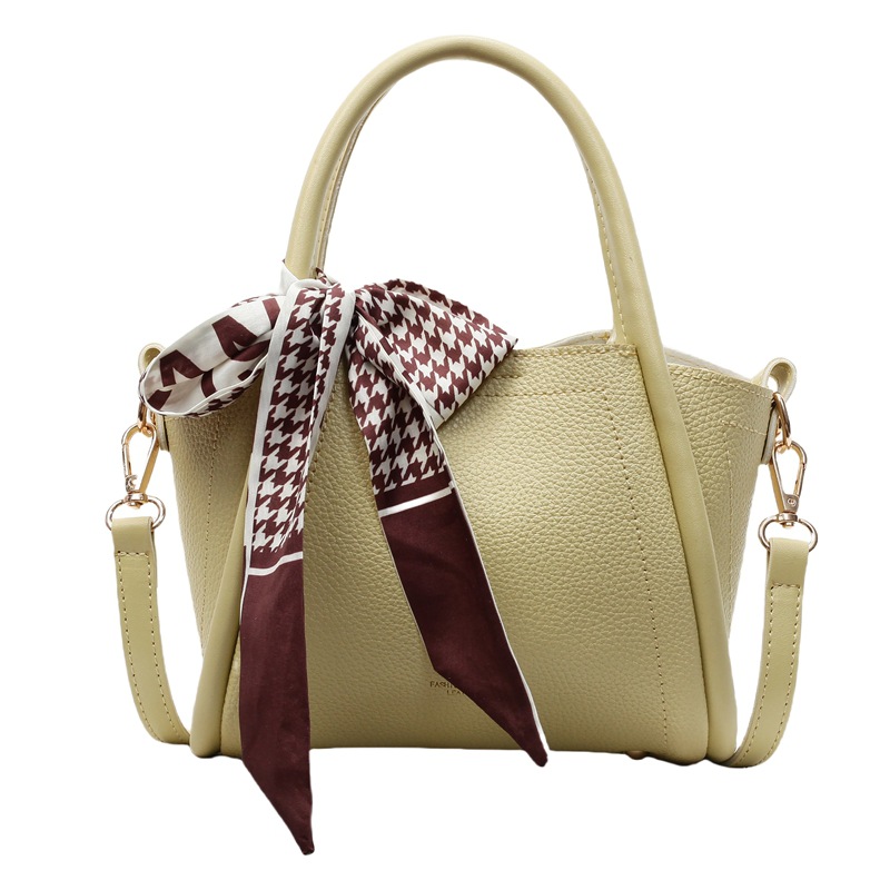 Bolso de cubo con patrón de lichi de alta gama para mujer 2025 nueva tendencia bolso de mensajero de todo fósforo casual bolso de cubo hembra portátil