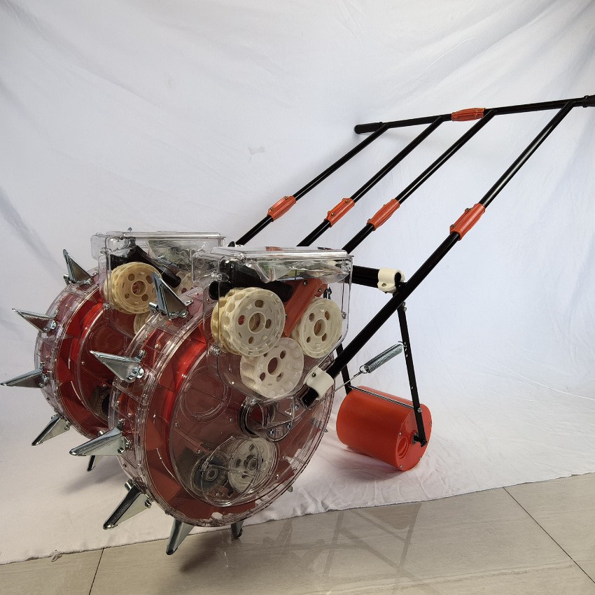 Siembra de maíz rodante siembra de siembra precisa nueva planta de soja agrícola multifuncional pequeña mano empujada