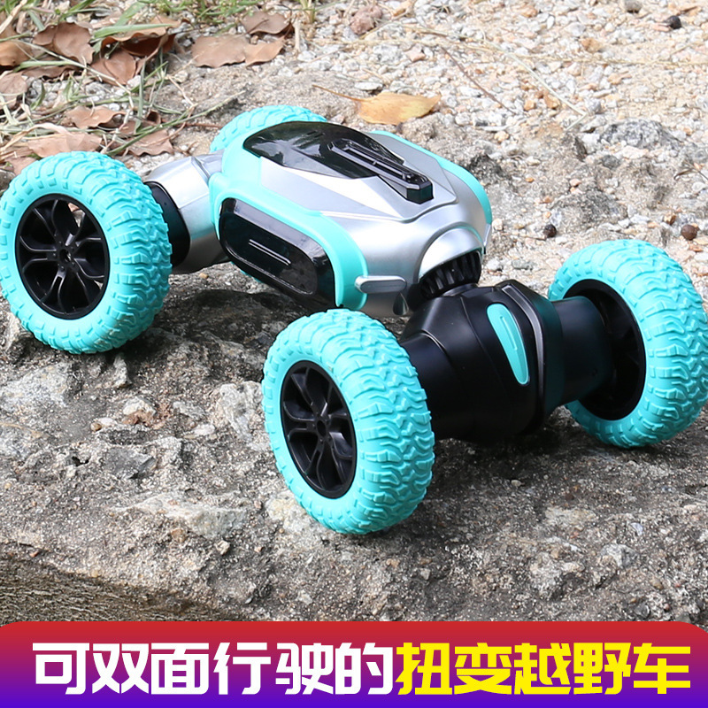 Transfronterizo coche de juguete controlado remotamente para niños acrobacias de deriva vehículo todoterreno cuatro ruedas vehículo de escalada bidireccional 2.4G coche de torsión de música