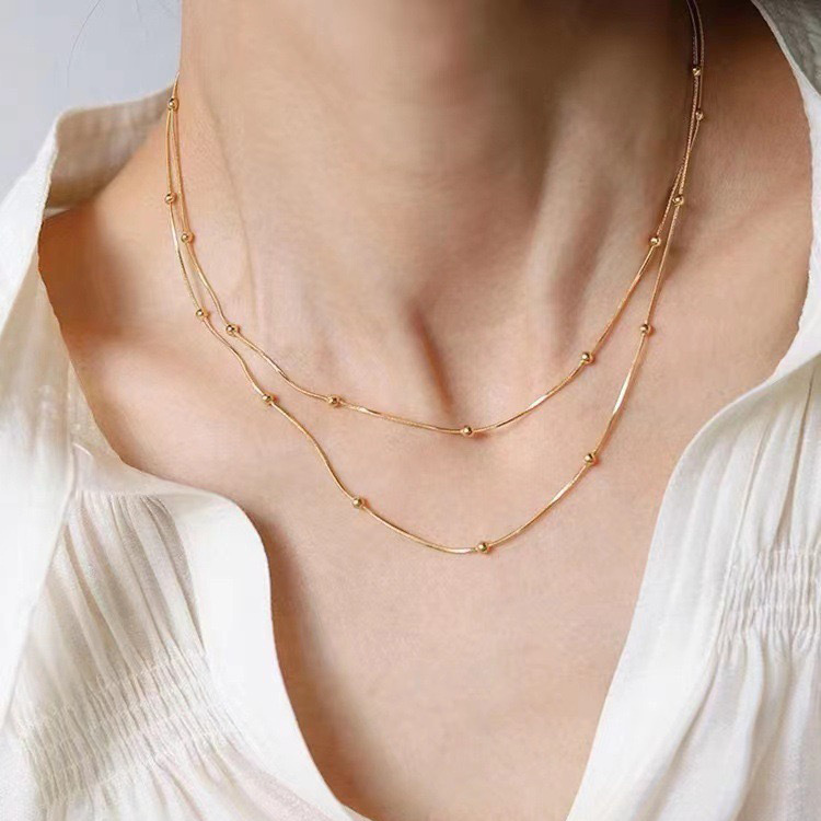 Collier cubain rétro haut de gamme en acier titane, style européen et américain, orné d'une pierre de zircon vert, à porter en niche de clavicule._voghion.com