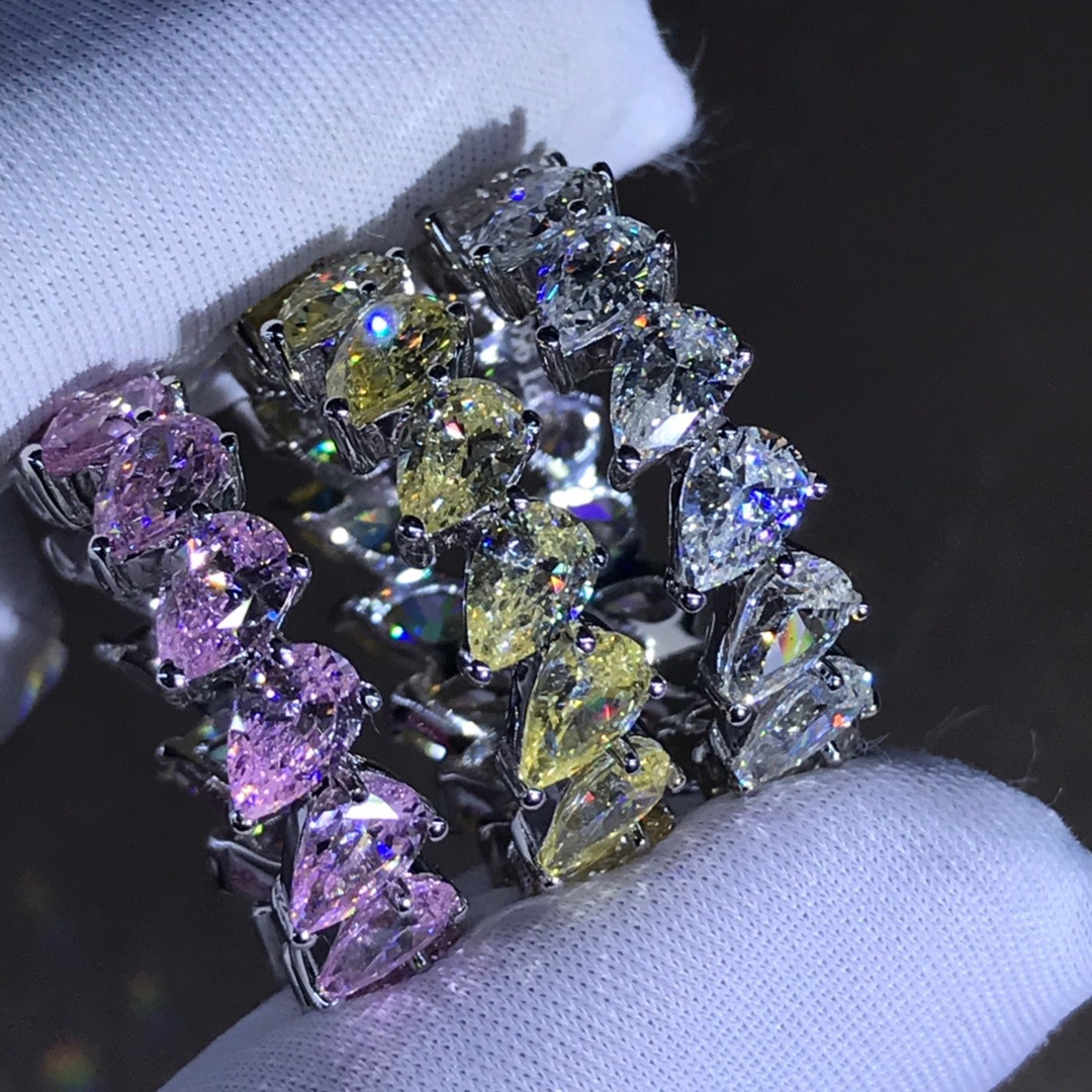 Gran marca mismo estilo gota de agua color diamante fila diamante anillo 30 puntos VVS nivel 3EX corte con incrustaciones importado anillo de diamantes de alto carbono