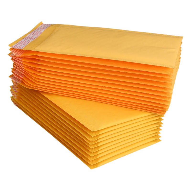 Bolso de burbuja de papel Kraft amarillo bolso de sobre burbuja a prueba de golpes expreso ropa impermeable logística embalaje bolsa de espuma fabricante