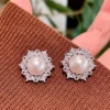 White earrings pearl with zircon