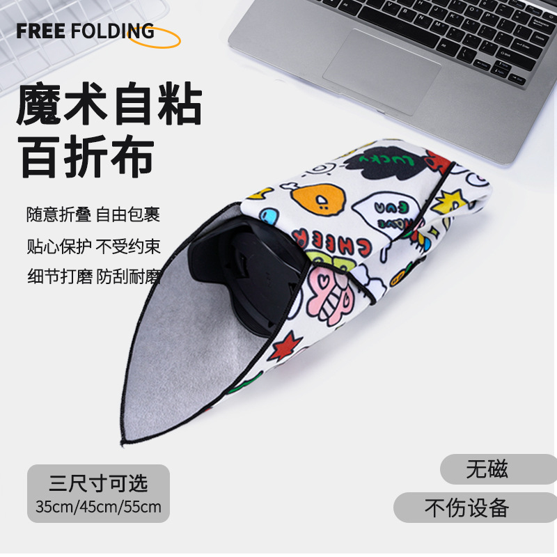 Self-adhesive pleated fabric camera sleeve, suitable for mirrorless and SLR cameras, providing lens protection and storage.