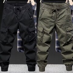ファッションブランドのカジュアルな服装のズボンの男性の春秋ファッションのブランドのゆったりした束の足の純色の工装のズボンの男性のアメリカ式のカジュアルなズボン