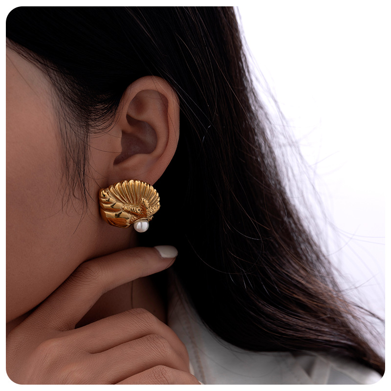 TENA Europa y América de moda conchas de diseño de estrellas de mar explosivo orejetas de acero inoxidable chapado en oro 18 quilates temperamento de orejetas marinas mujeres