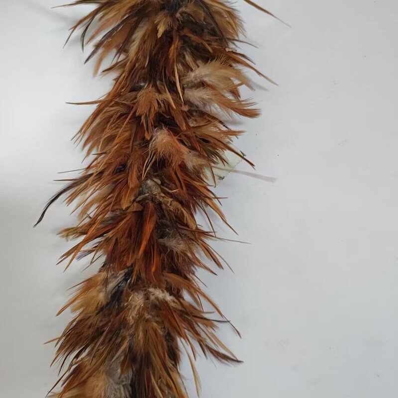 本物の鶏の毛の禅の子はほこりを払います。|undefined