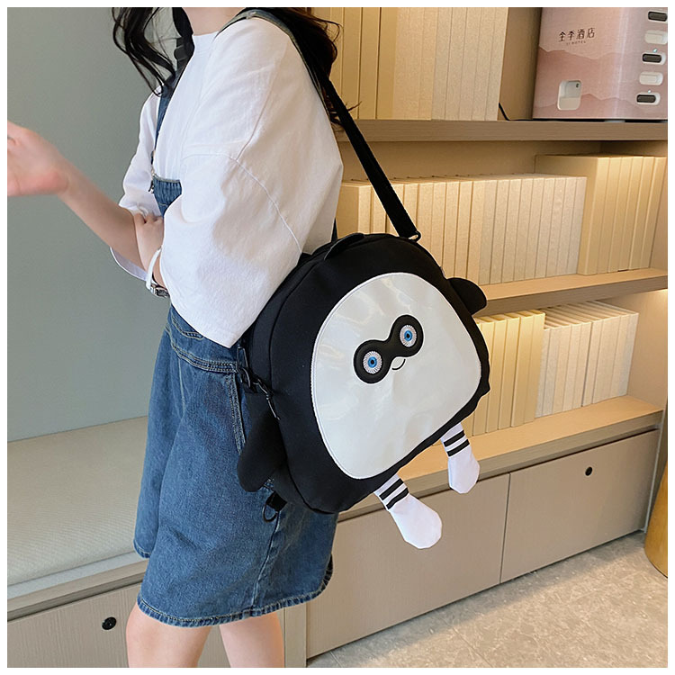 The new 2024 children's egg-shaped party backpack is a cute cartoon canvas single-shoulder bag and a fashionable and stylish small backpack undefined