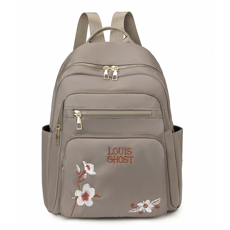 Mochila de tela Oxford para mujer 2024 nueva moda mochila de todo fósforo diseño de nicho mochila de viaje de viaje