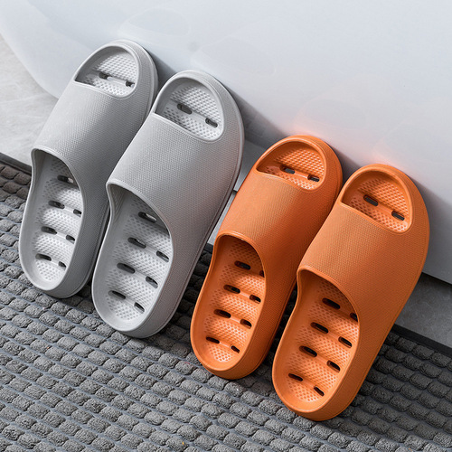 EVA slippers thick-soled non-slip bathroom bathing anti-odor summer household water leakage hollow indoor shoes with a sense of stepping on shit wholesale