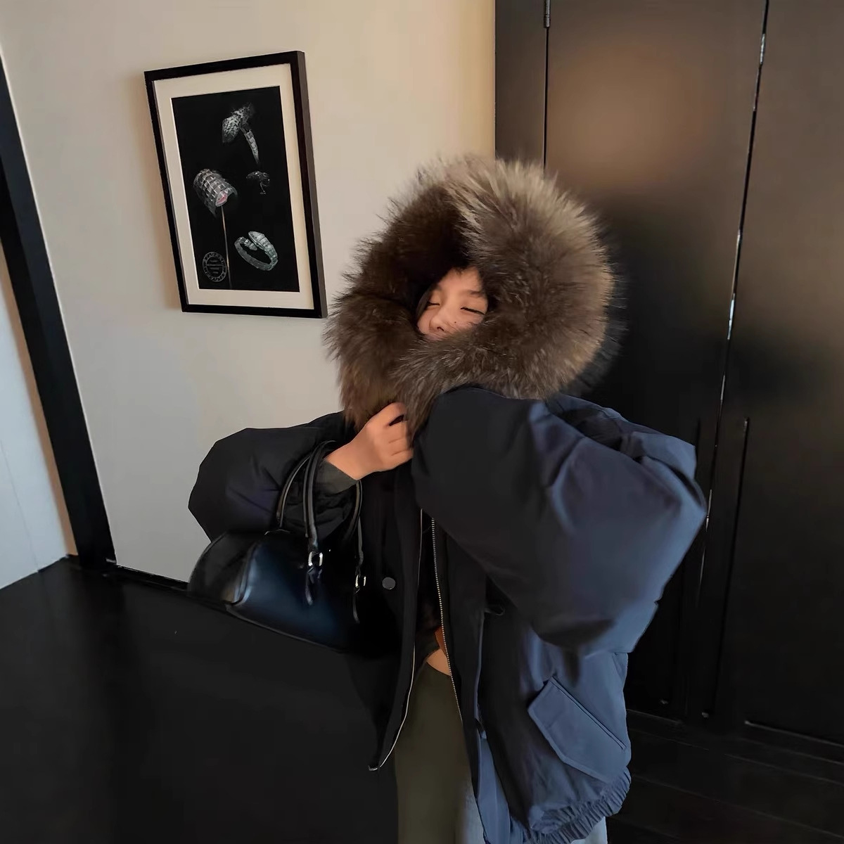 Corea de alta sensación hermoso botón de cuerno de buey encapuchado ropa de algodón para mujeres invierno 2025 nuevo tipo de chaqueta de algodón gruesa image 2