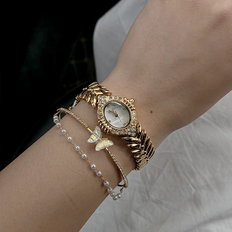 Scottie9773 Shi Gaodi Nuovo orologio da donna ovale in oro con cinturino a coda di pesce_voghion.com