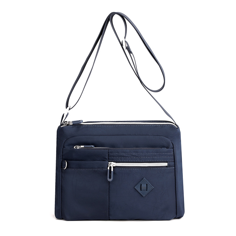 Bolso de mujer 2023 nuevo bolso de hombro impermeable de tela Oxford bolsa de mensajero de tela de nylon bolsa de viaje de mujer de mediana edad