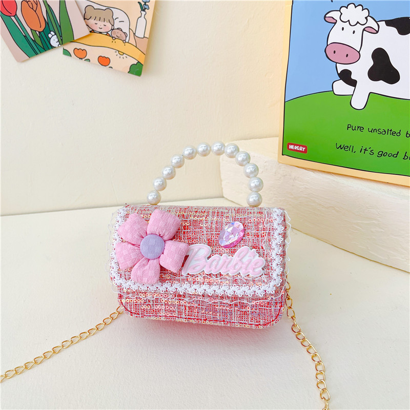 Bolso de los nuevos niños al por mayor bolso de princesa Linda pequeña flor arco accesorios bolsa versátil bolsa de mensajero de las muchachas
