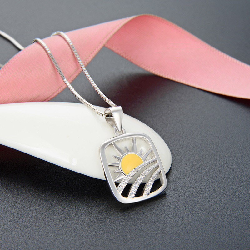 S925 plata esterlina amanecer colgante hueco nicho de diseño femenino diamantes de moda moda joyas temperamento fuente al por mayor