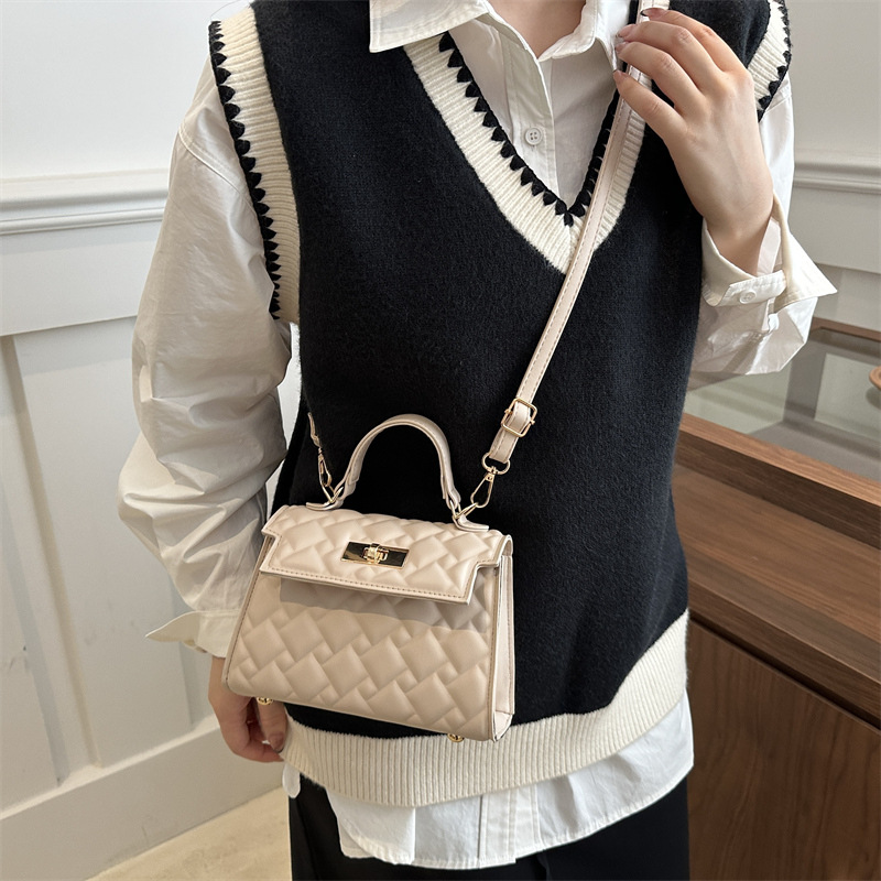 Bolso de mano con cerradura de cercanías para mujer 2024 otoño e invierno nuevo estilo salvaje ins diseño de nicho bolso salvaje ins Kelly