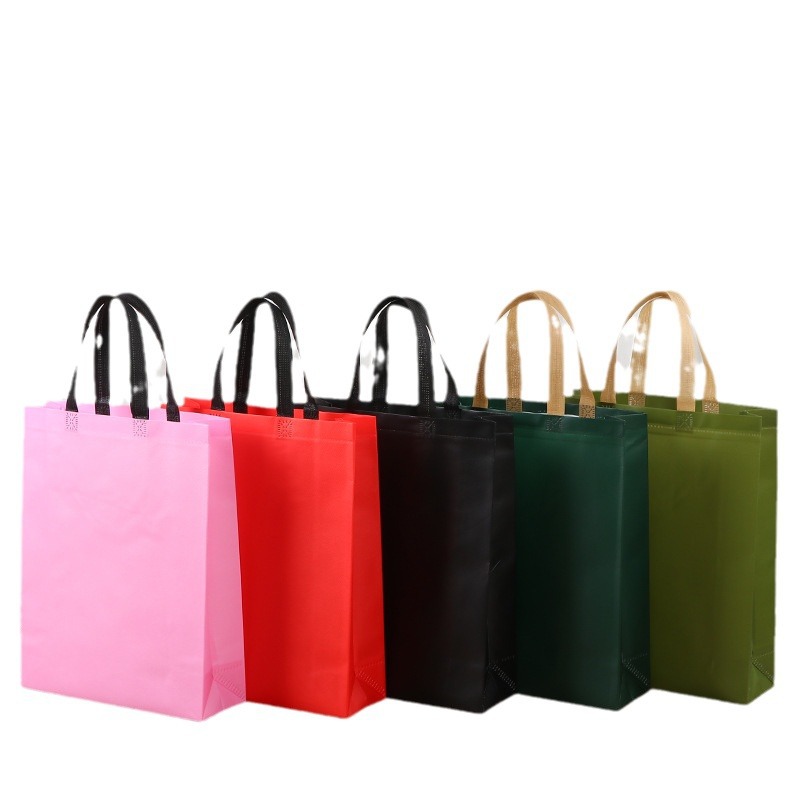 Bolsa de mano no tejida de color spot bolsas de compras de mano en blanco engrosadas logotipo publicitario impresas bolsas no tejidas image 5