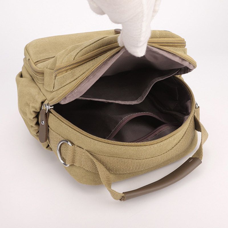 2024 Bolso de pecho de lona retro de moda para hombre nuevo transfronterizo Bolso de mensajero para hombre multifuncional al aire libre de gran capacidad