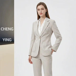 深圳南油新款2026早春新款减龄学院风刺绣徽章口袋一粒扣西装外套
