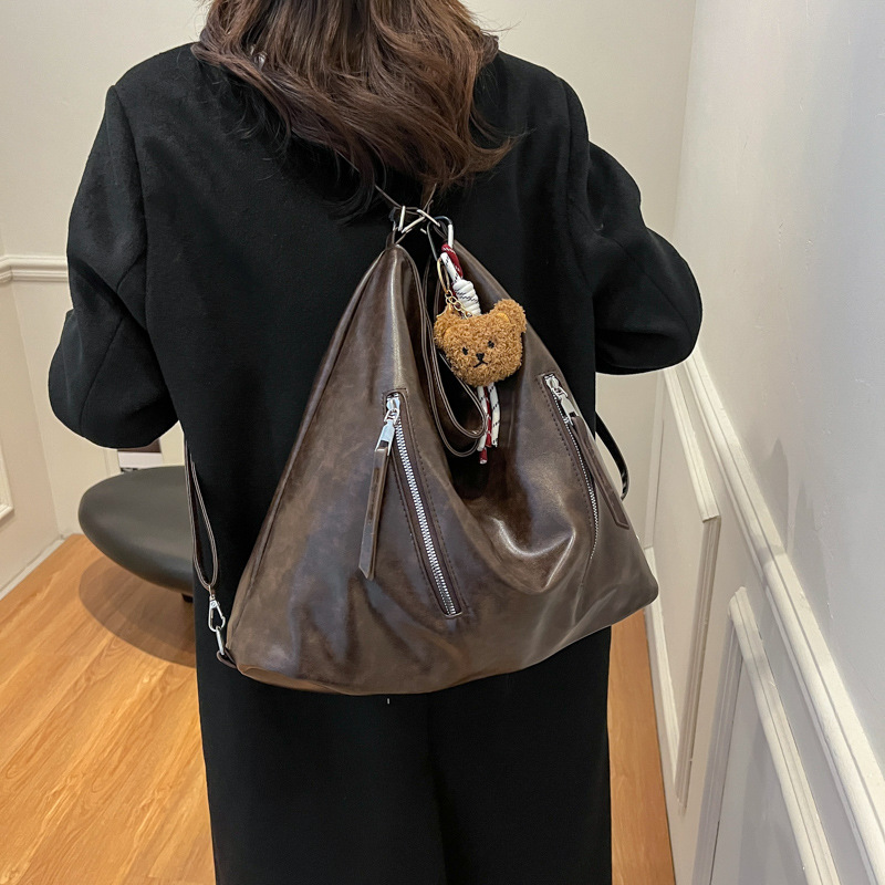 Otoño y invierno nueva mochila de gran capacidad de textura sólida coreana 2024 mochila de viaje de la moda de la mochila de trabajo