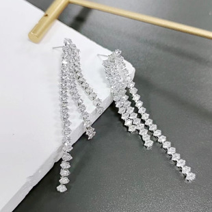 European and American Exaggerated Ear Jewelry New Style Personalized Long and Short Claw Chain Chain Tassel Earrings Elegant Women's All-match Earrings