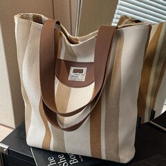ストライプのキャンバスバッグ女性2025新型夏カジュアル軽便ショルダーバッグ大容量マミーバッグ