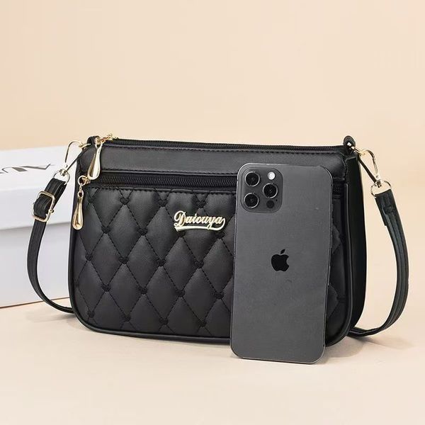 Capacious shoulder bag