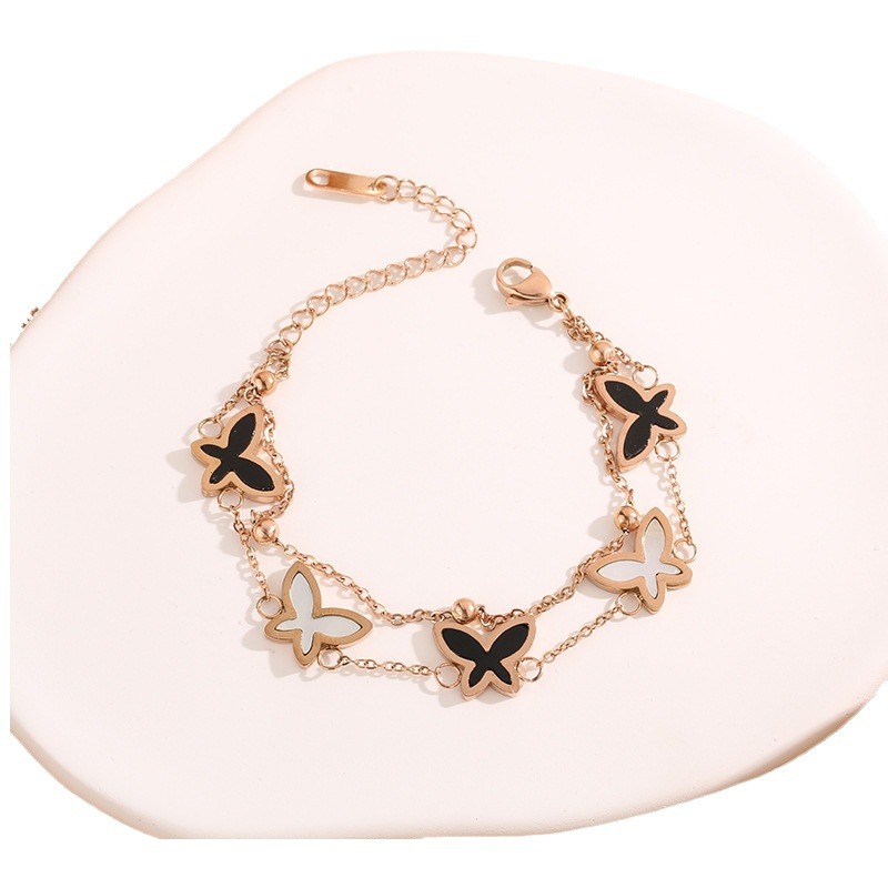 Estilo coreano blanco y negro Concha mariposa pulsera de oro rosa geométrica de doble capa pulsera de acero de titanio fábrica de joyas para niñas