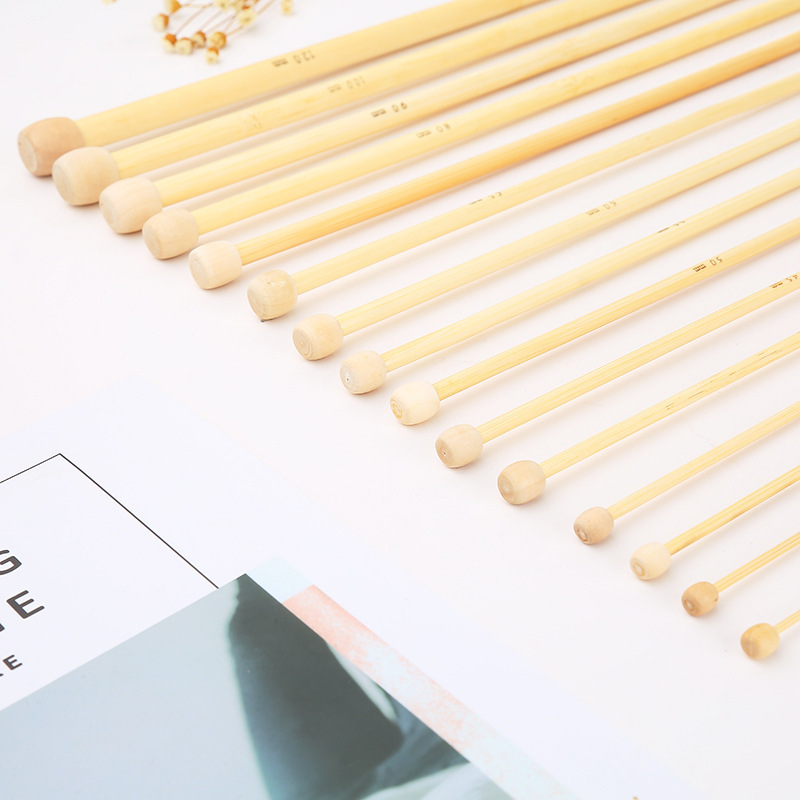 Venta directa de fábrica Color primario Aguja de bambú Herramienta de tejido Aguja de suéter Aguja de lana Protección del medio ambiente natural Aguja de bambú de un solo cabezal al por mayor