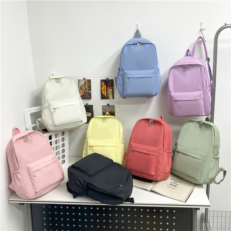 Solid Color Student Schoolbag Cross-border Simple Campus Backpack Large Capacity Junior High School Nylon Backpack Printable LOGO Solid Color Student Schoolbag Cross-border Simple Campus Backpack Large Capacity Junior High School Nylon Backpack Printable LOGO