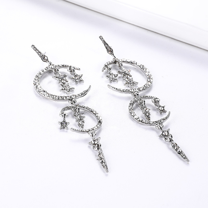 Europeo y americano clásico popular nuevo romántico diamante estrella Luna pendientes largo diamante incrustado elegante mujer pendientes Venta caliente
