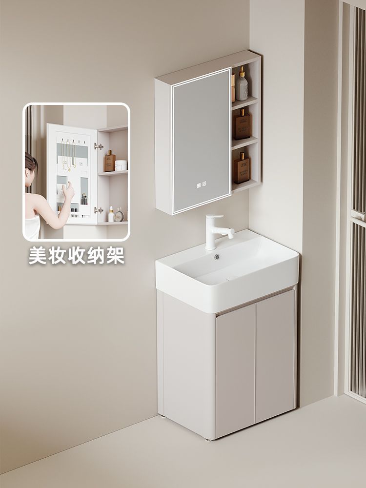 Crema pequeño apartamento gabinete de baño piso combinación espacio engrosado panal lavabo de cerámica integrado